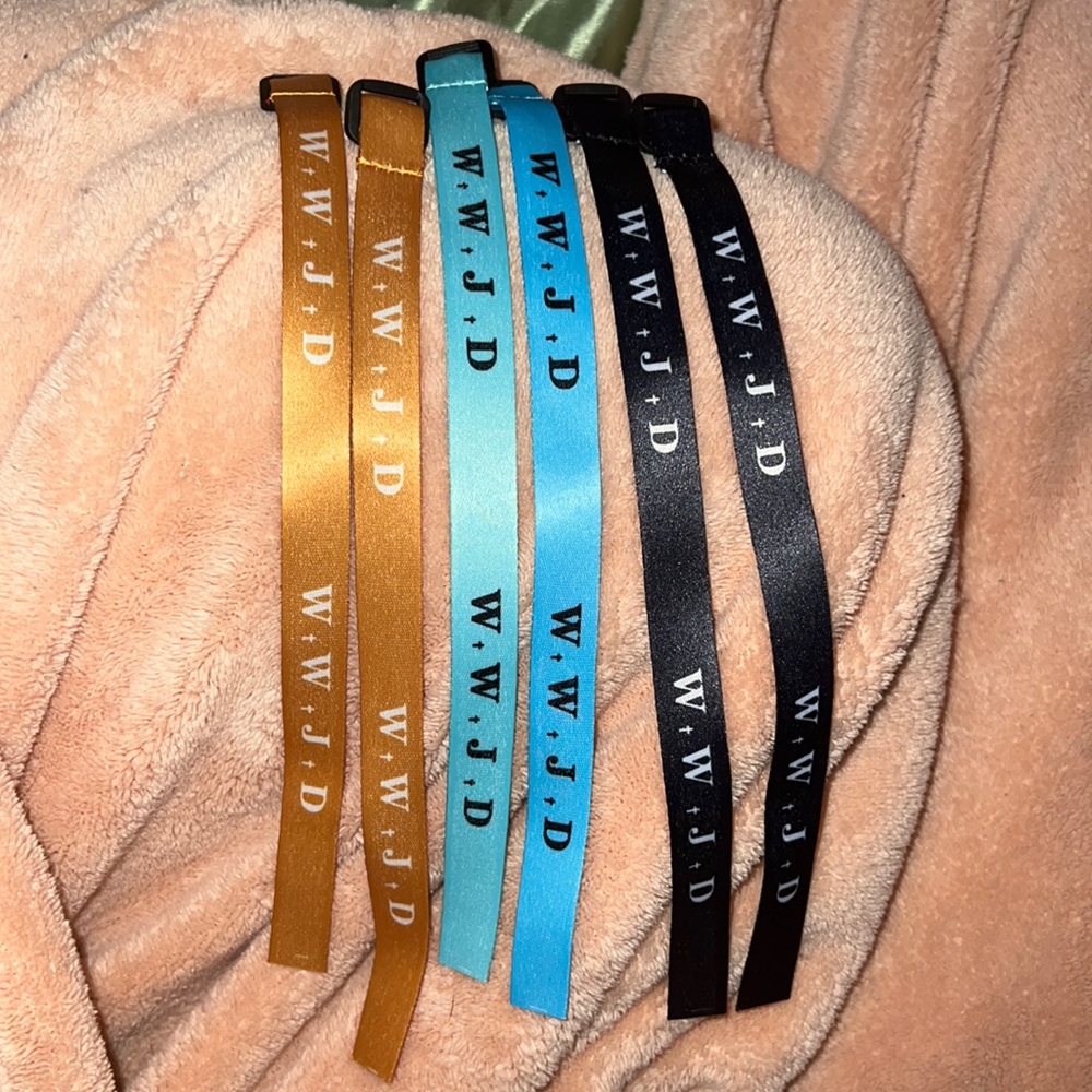 WWJD bundle THIS IS A QUICK LIST!!! Cream, light blue, and black bracelets.
